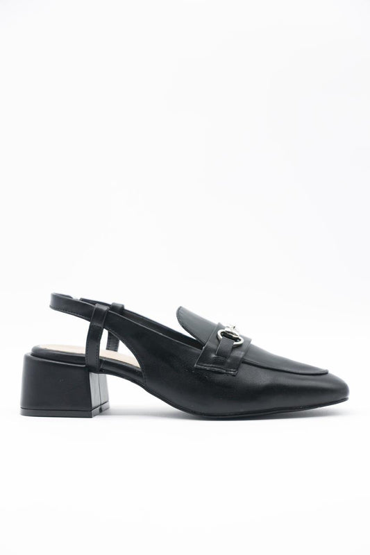Black shoe with a small decorative element on a white background