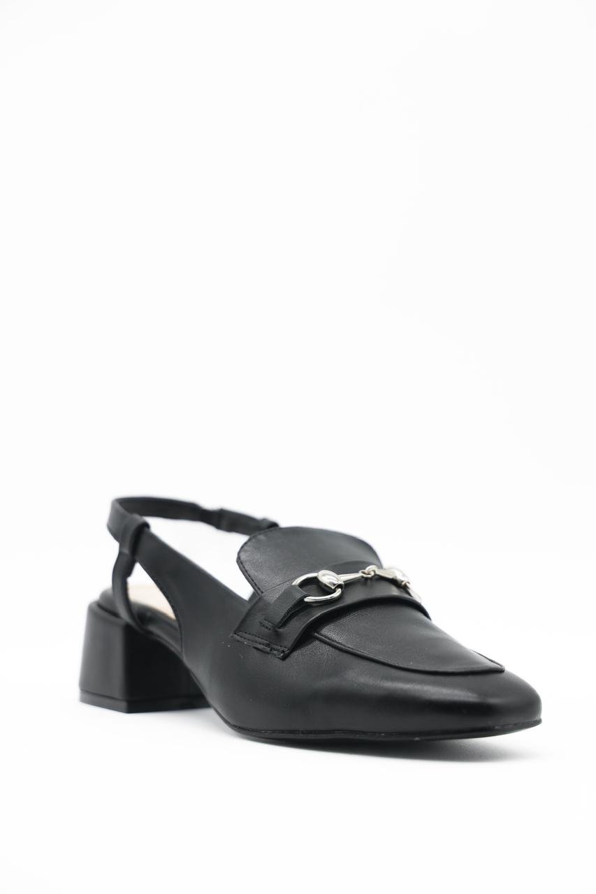 Black leather loafer with a small chain detail on a white background